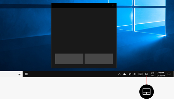 Windows 10 desktop with the virtual touchpad open and its taskbar icon highlighted